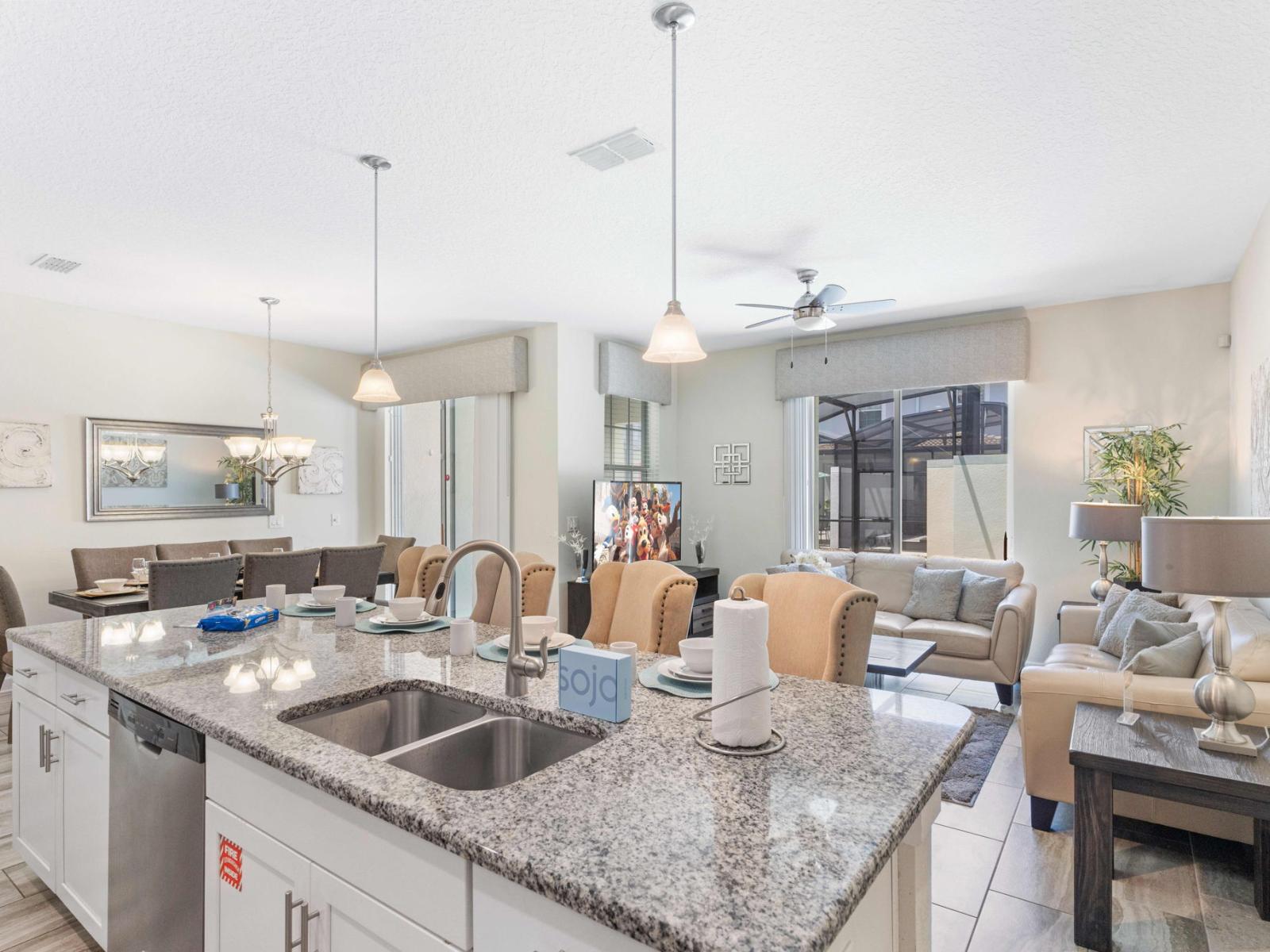 This open layout of the kitchen, dining and living room is professionally designed and decorated to give our guests airy feel throughout the home.