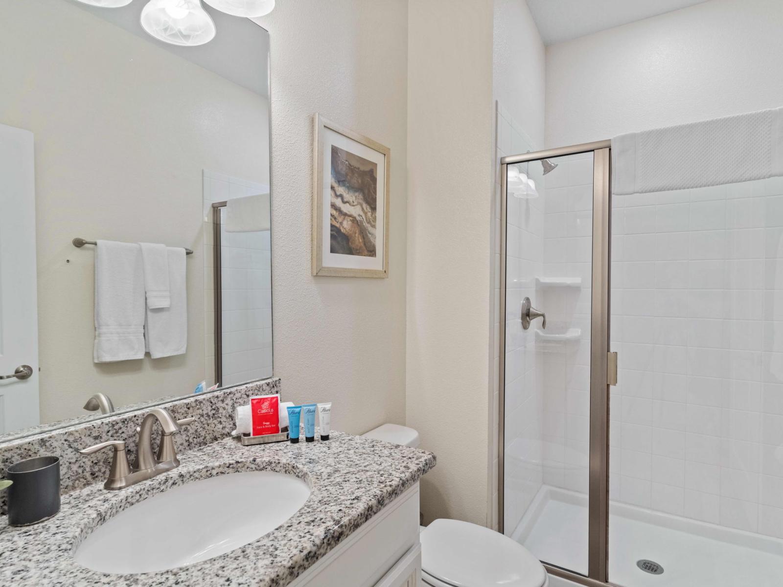 Bathroom Bliss: Refresh in Bathroom 1 Featuring a Convenient Walk-in Shower.