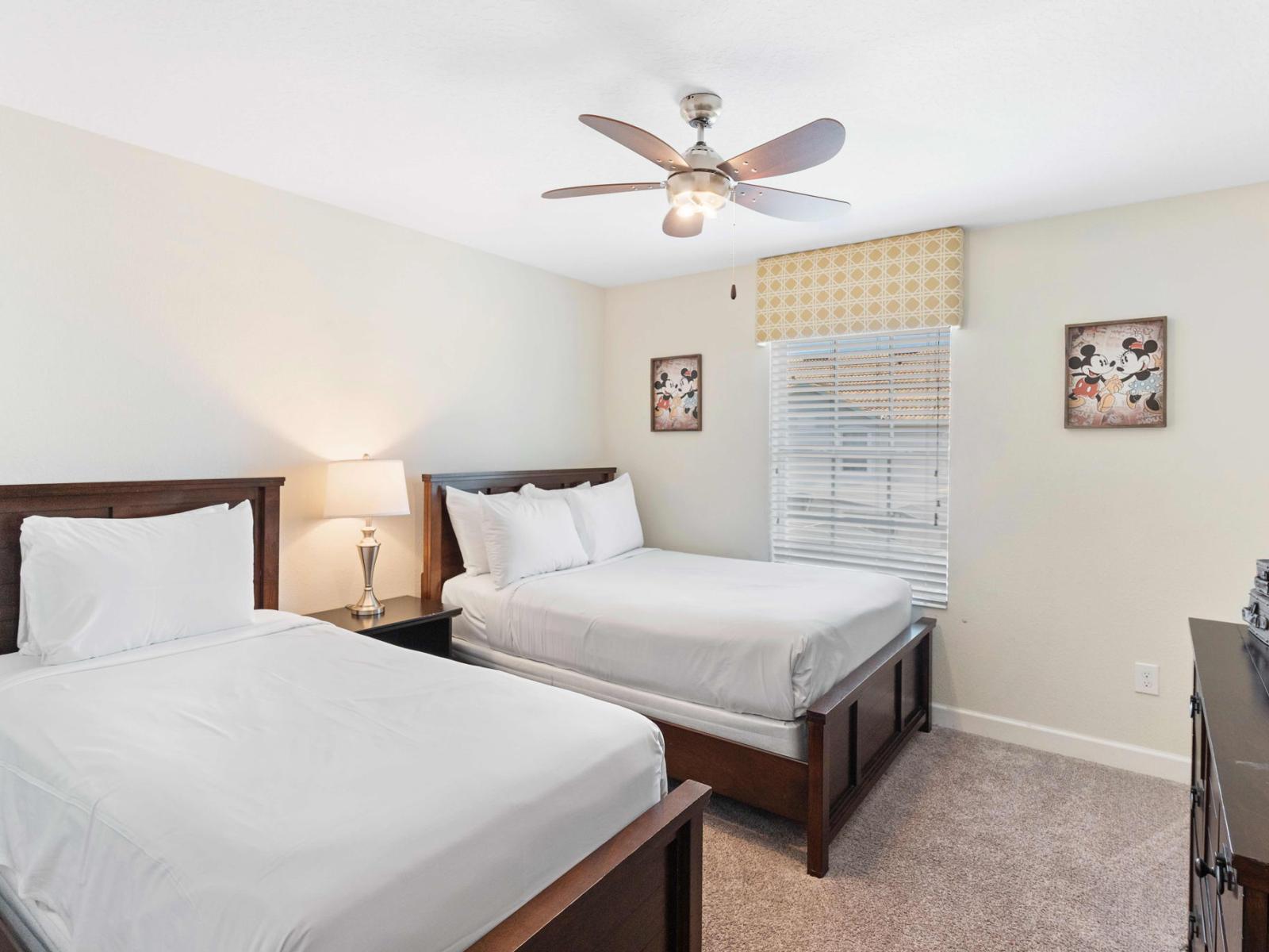 Stay Cool and Comfortable: Bedroom 4 Featuring a Ceiling Fan for Added Comfort and Relaxation.