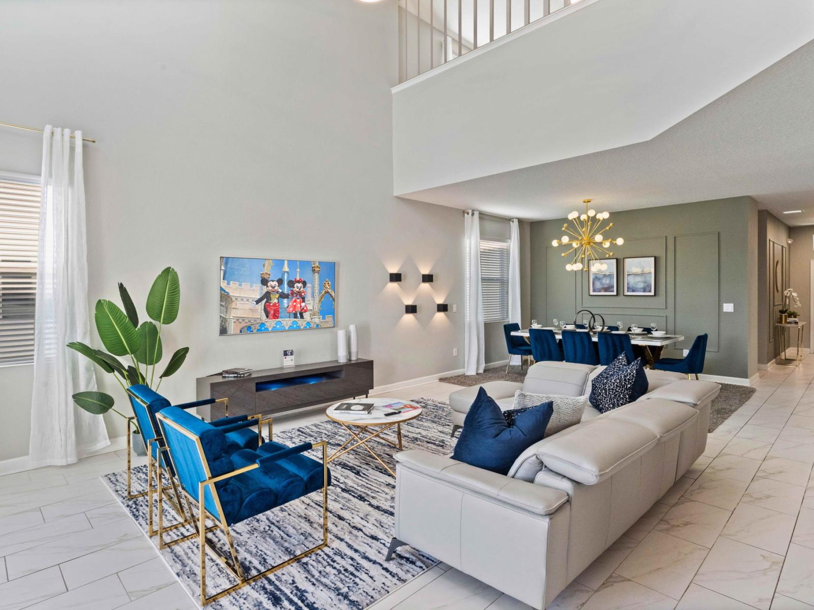 The open living area, seamlessly blending modern comfort with a state-of-the-art smart TV. Unwind, watch your favorite shows, and create unforgettable moments in this inviting space designed for leisure.