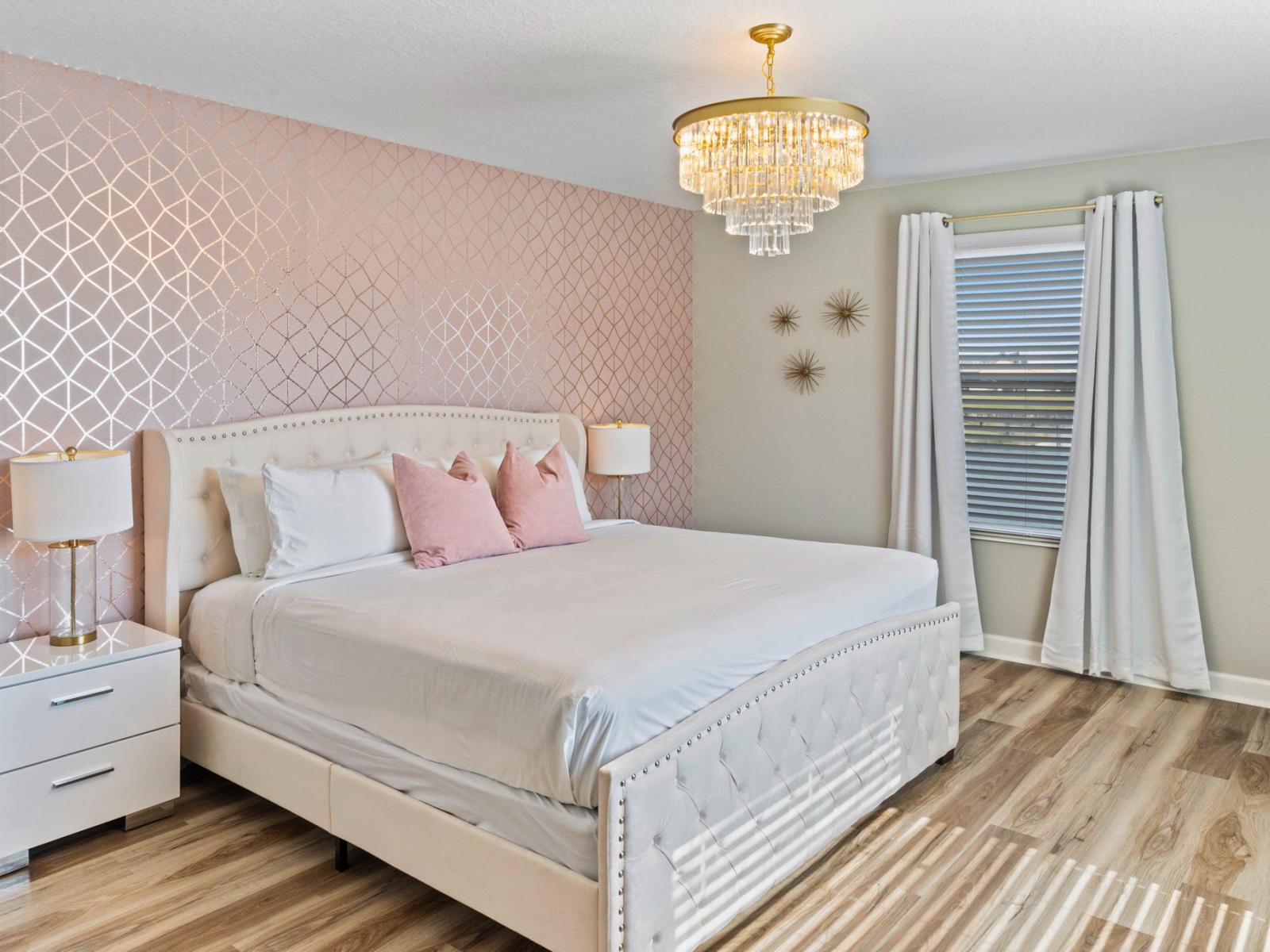 Enchanting bedroom of the home in Kissimmee Florida - Well-appointed bedroom with neutral tones for a calming atmosphere - Cozy retreat with a plush double bed, perfect for relaxation