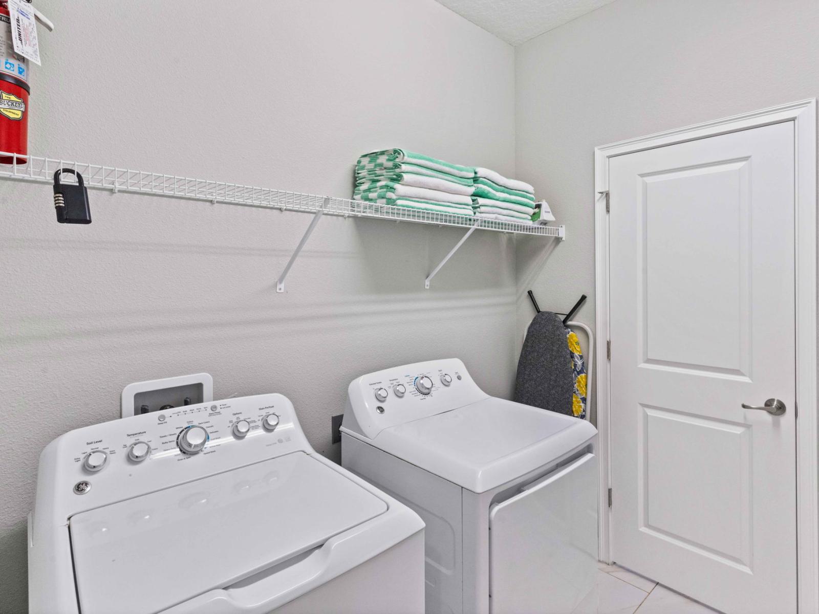 Laundry area of the home in Kissimmee Florida - Private washer and dryer - Maintain a fresh wardrobe with our accessible laundry facilities - Convenient addition to make your stay even more comfortable