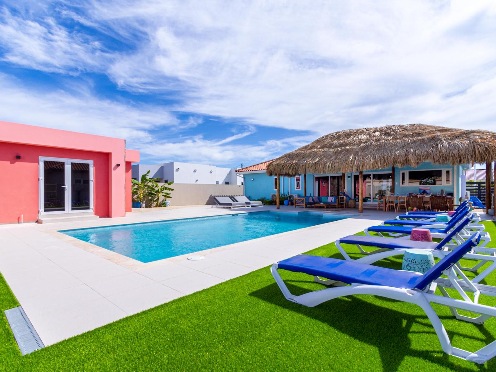 Vibrant Pool Area - feel the warmth of the sun and lie down by the pool