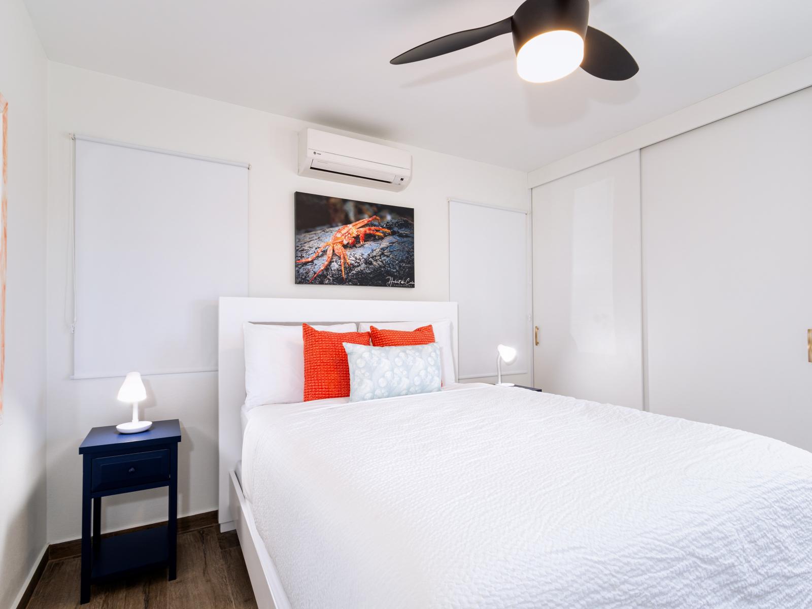 Relax in style: Bedroom 4 welcomes you with a comfortable queen bed and a TV, providing the perfect setting for rest and relaxation during your stay.