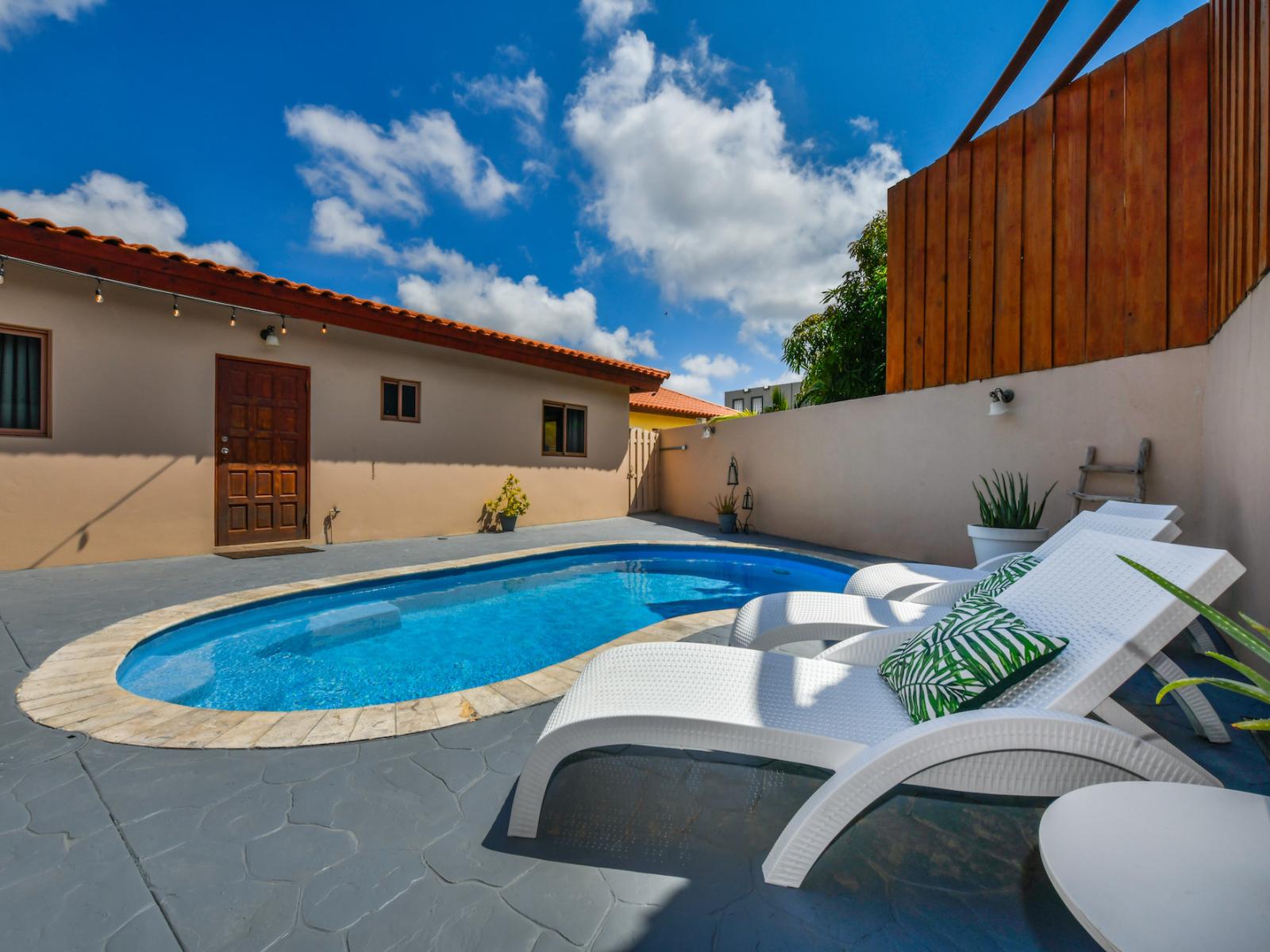 Private pool and outdoor kitchen- enjoy the outdoors even more! swim, dine out and relax.