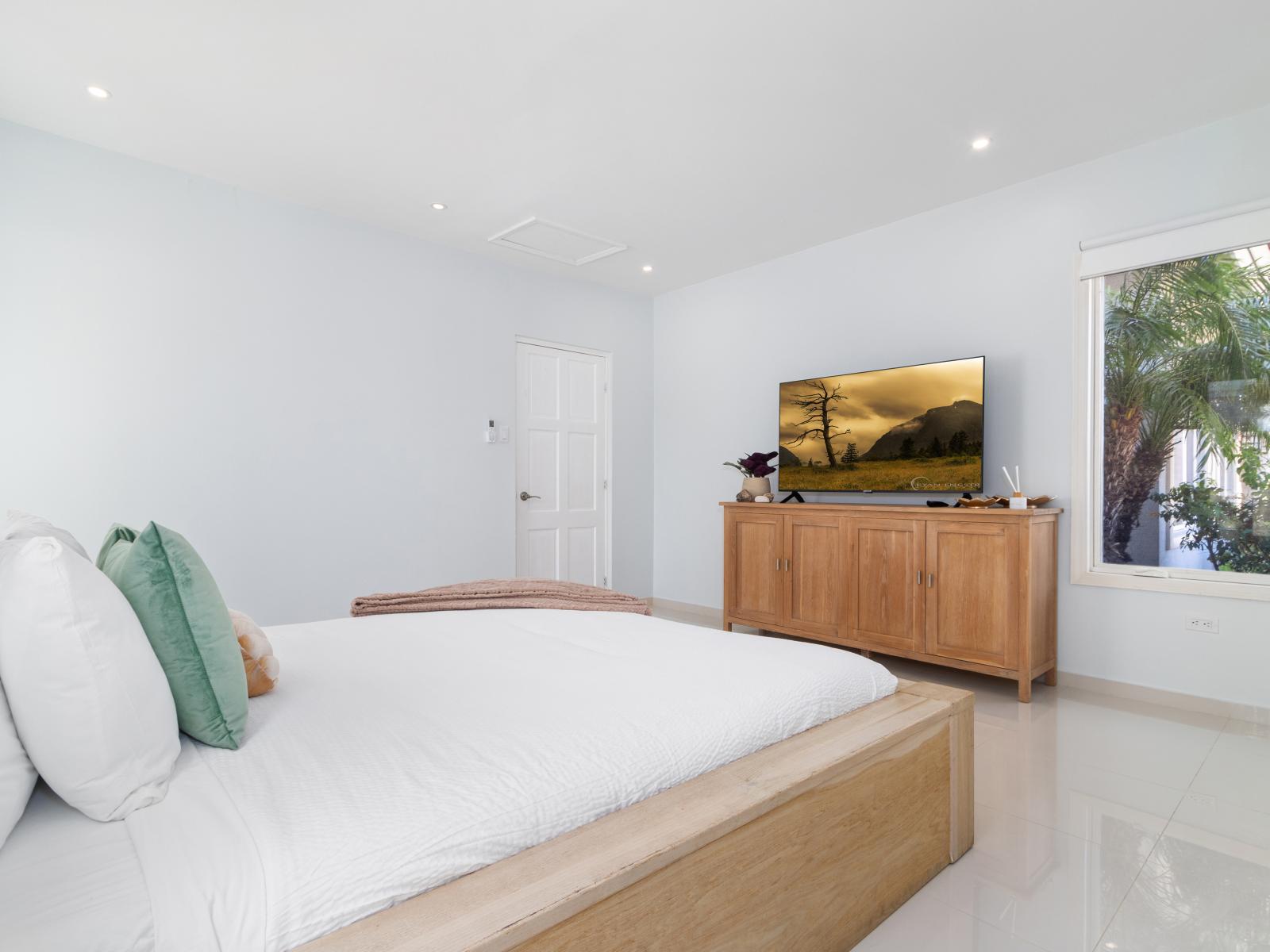 Bedroom 2 includes a Smart TV for entertainment convenience.