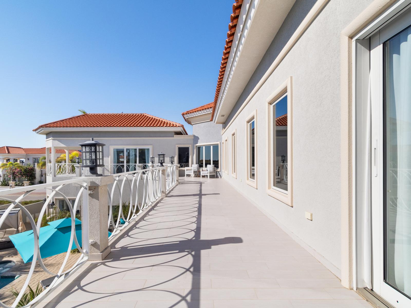 Bedroom balcony offering a private retreat with views of [insert specific feature], perfect for relaxing and enjoying the outdoors.