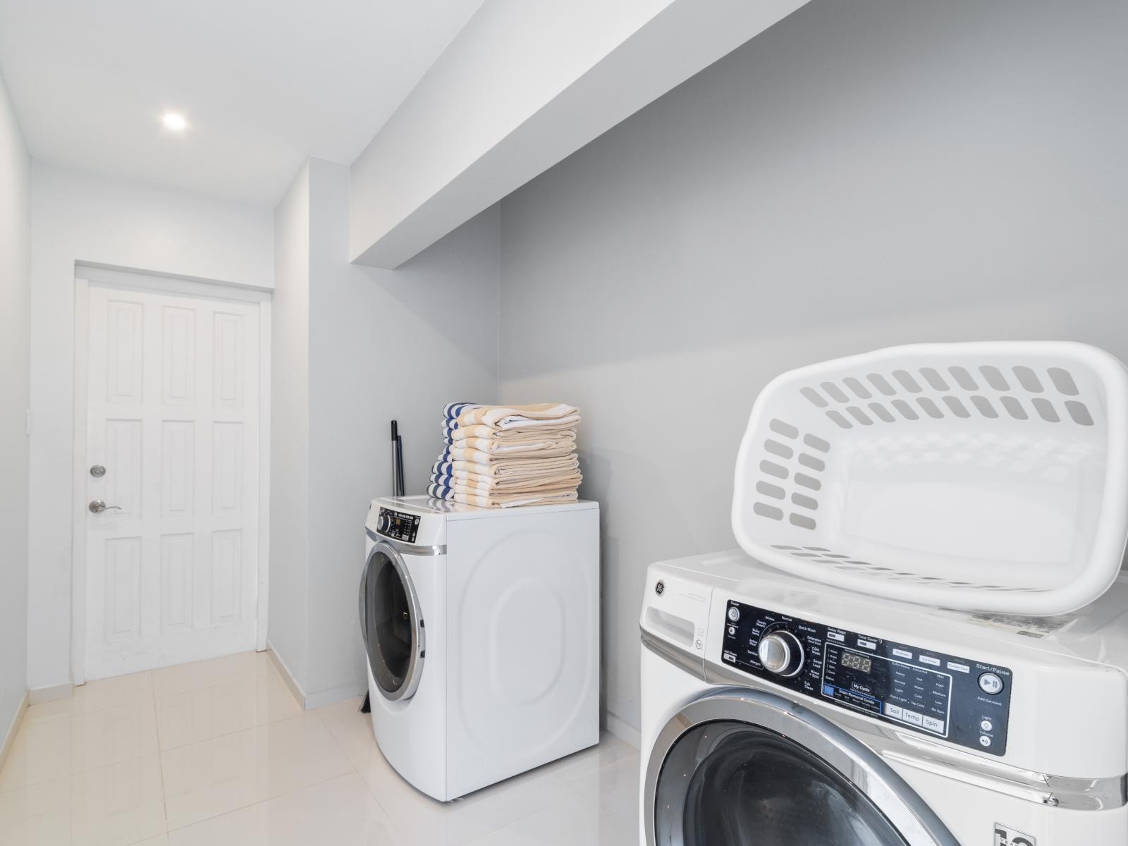 Enjoy the convenience of a dedicated laundry area of the Apartment during your stay. - Keep your vacation wardrobe fresh with our on-site laundry facilities. - Keep your clothes clean and fresh with our on-site laundry amenities.