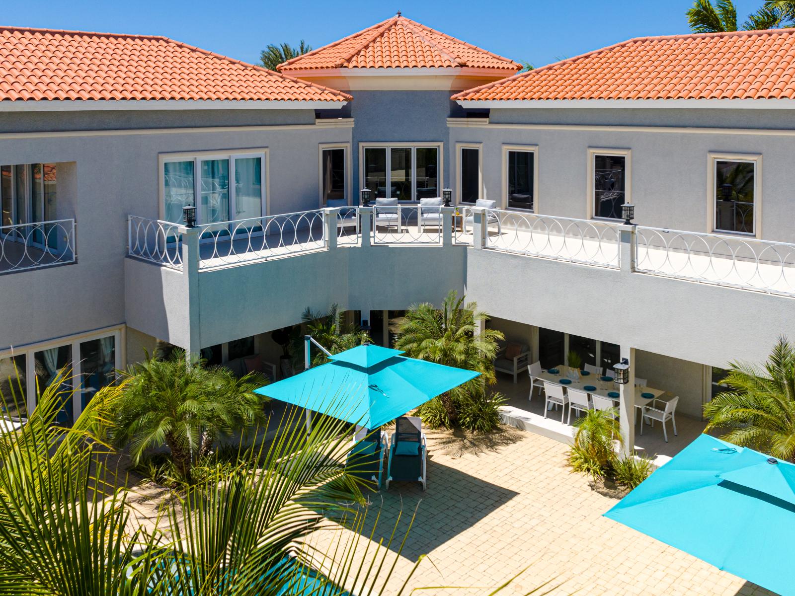 Second floor patio featuring breathtaking ocean views, ideal for relaxation and soaking in the scenery.