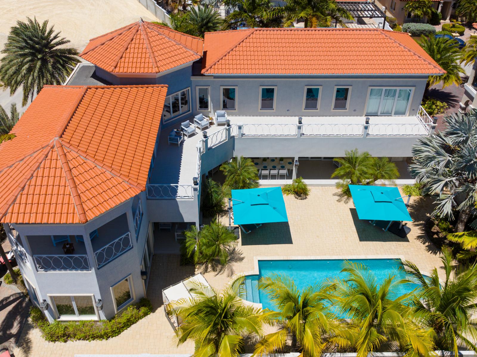 Aerial photo of the pool area and the second floor patio