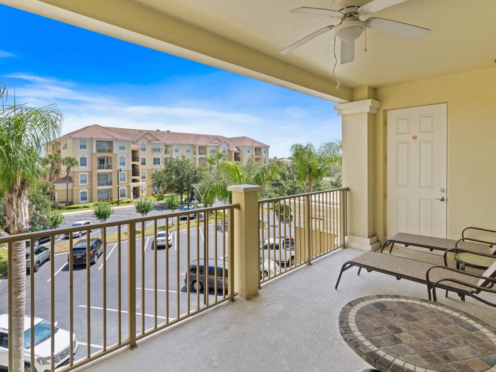 Mesmerizing private balcony of the condo in Orlando  - Cozy table and seats to enjoy the surrounding views - Be sure to get outside and enjoy the fantastic and stunning sunset views from your private balcony