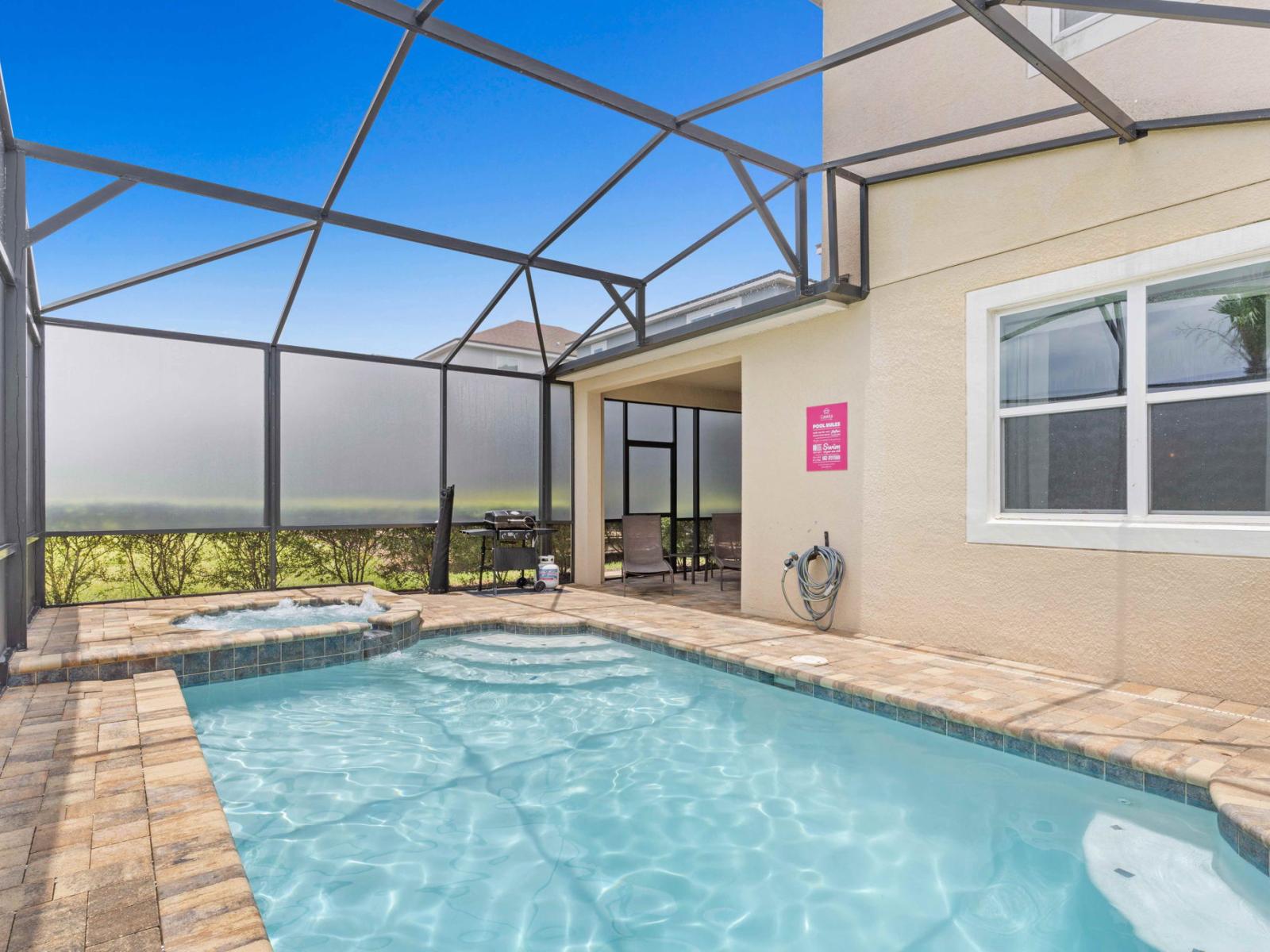 Resplendent private pool area of the home in Kissimmee Florida - Provides a relaxed atmosphere for unwinding  - Space for swimming, games, and activities - Inviting pool area for a perfect getaway