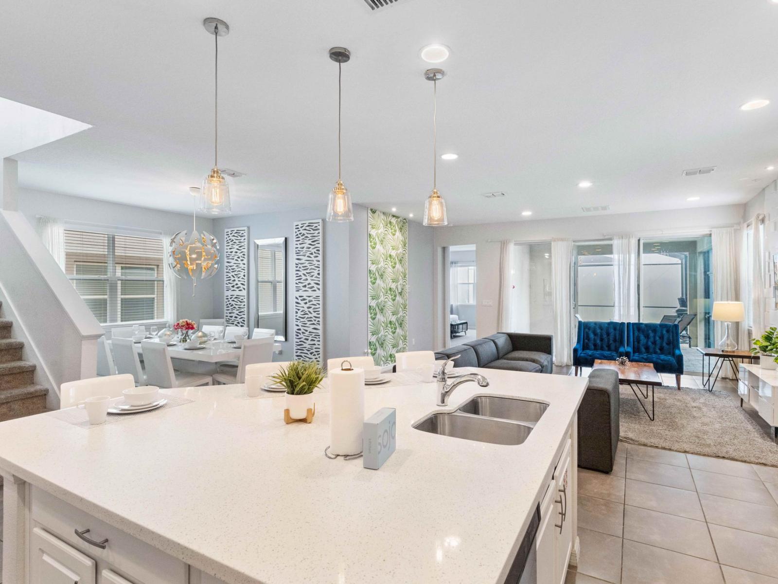 Full equipped kitchen with a large counter top table for more space to prepare your food