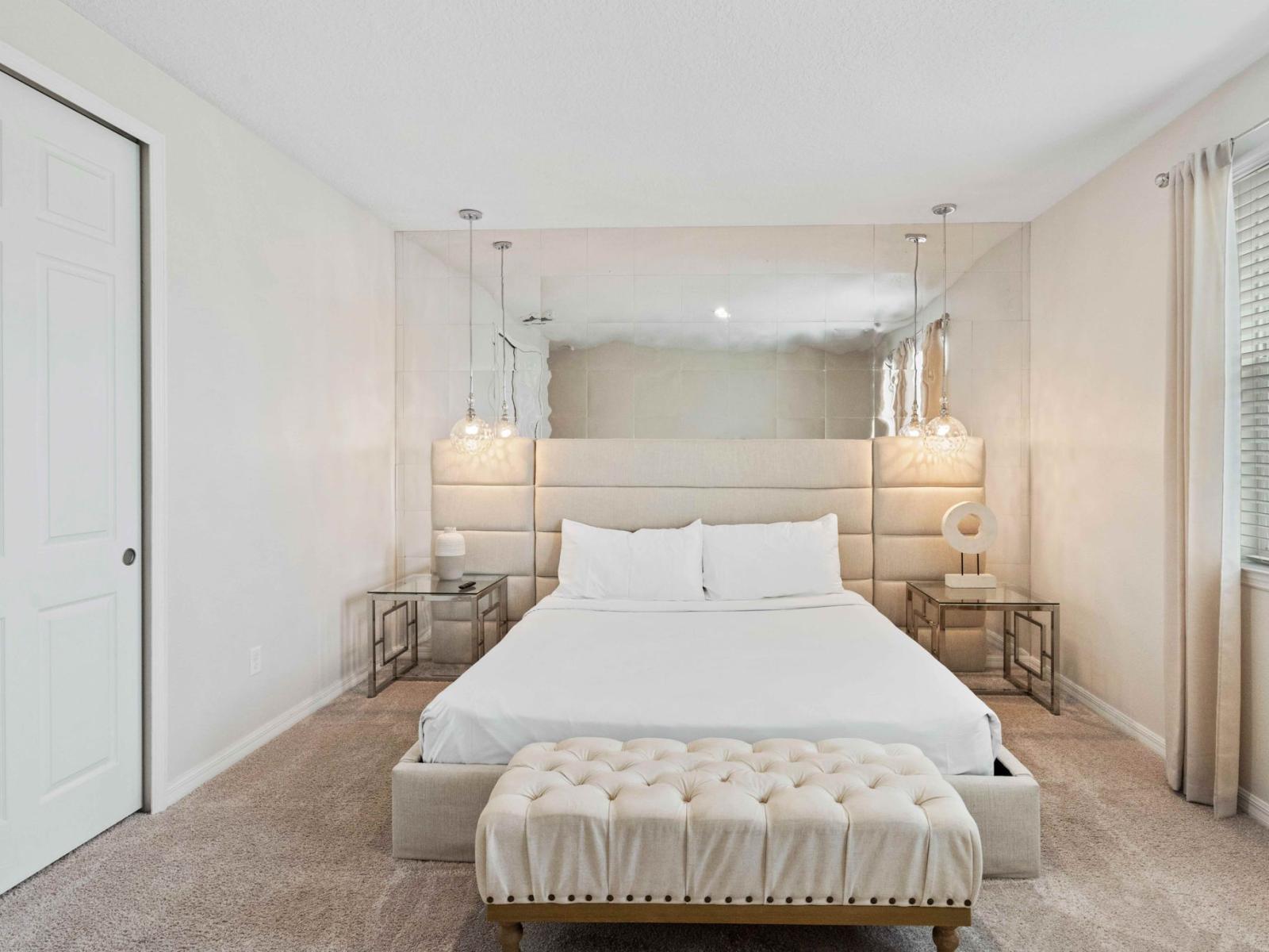 Serene bedroom of the home in Kissimmee Florida - Unwind in style in cozy double bed - Majestically decored with mirror and statement lighting - Offer the perfect sanctuary for relaxation