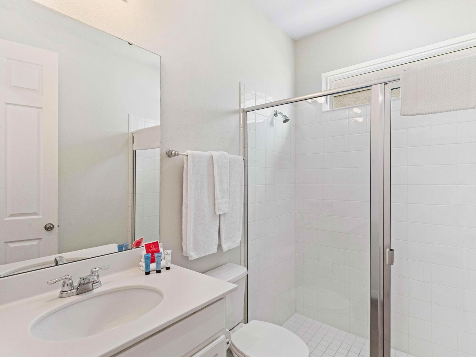 Bathroom Haven: Embrace the luxury of our ensuite space, offering a tranquil and spacious walk-in shower – a personal haven for relaxation and rejuvenation.