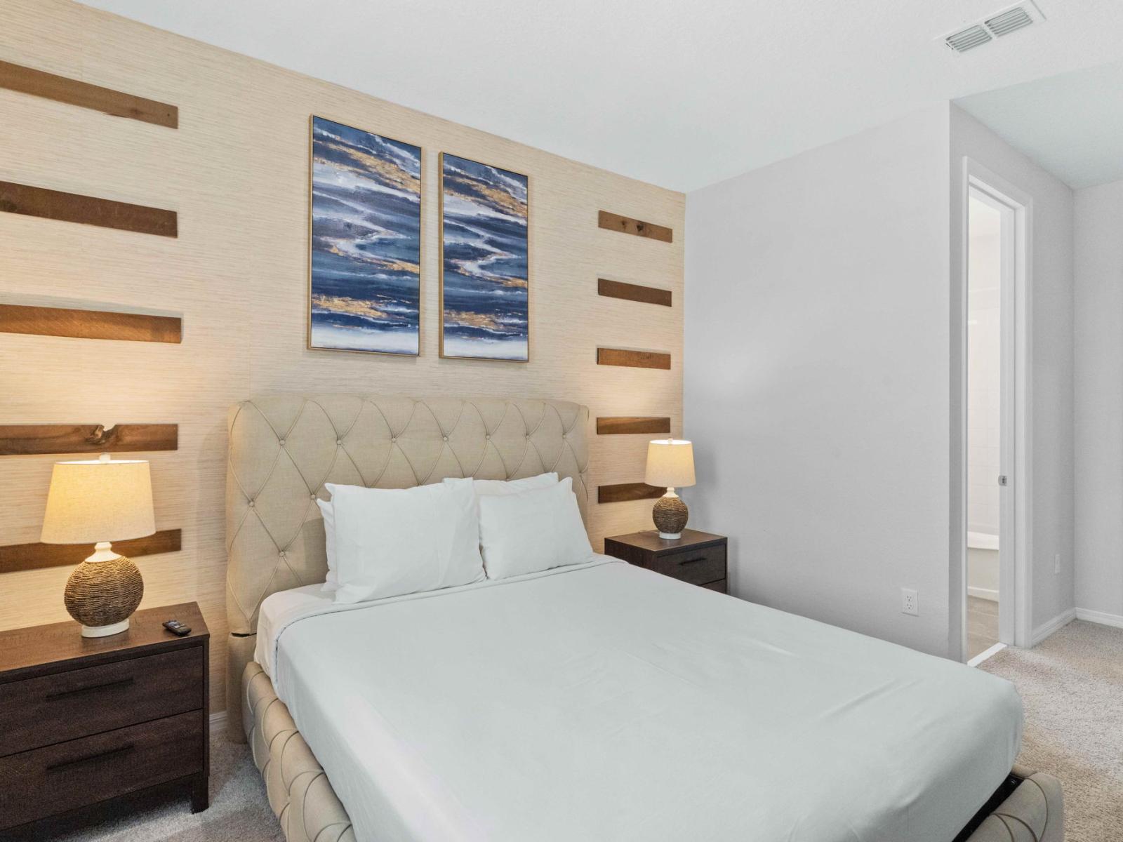 Chic Sleep Space: Indulge in the elegance of our bedroom, featuring a plush queen-sized bed and an entertainment-ready TV and ensuite bathroom for a cozy and stylish getaway.