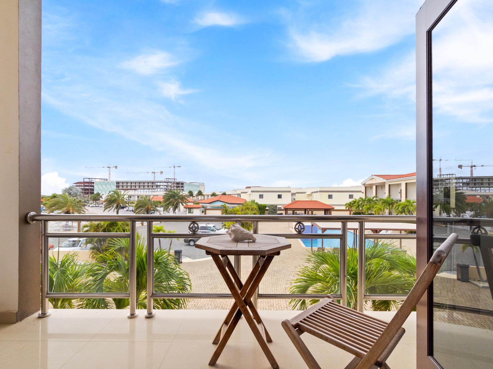 Private Balcony of the 2BR Condo in Noord Aruba - With view of the pool - Refreshing Atmosphere - Mesmerizing views