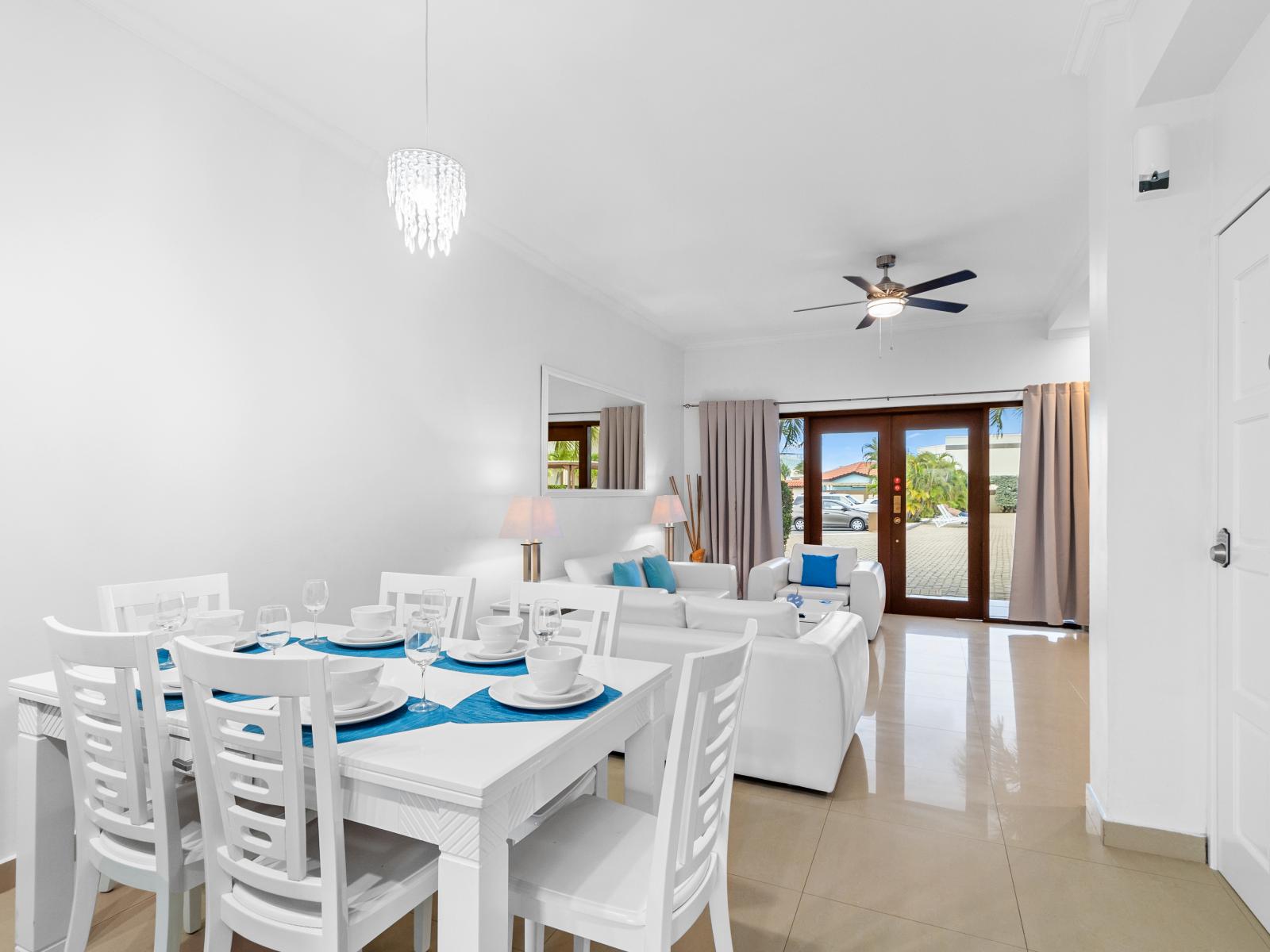 Elegant Dining Area of the 2BR Condo in Noord Aruba - Dining area ideal for sharing meals - 6 Persons Dining - Spacious open-plan design for a modern feel