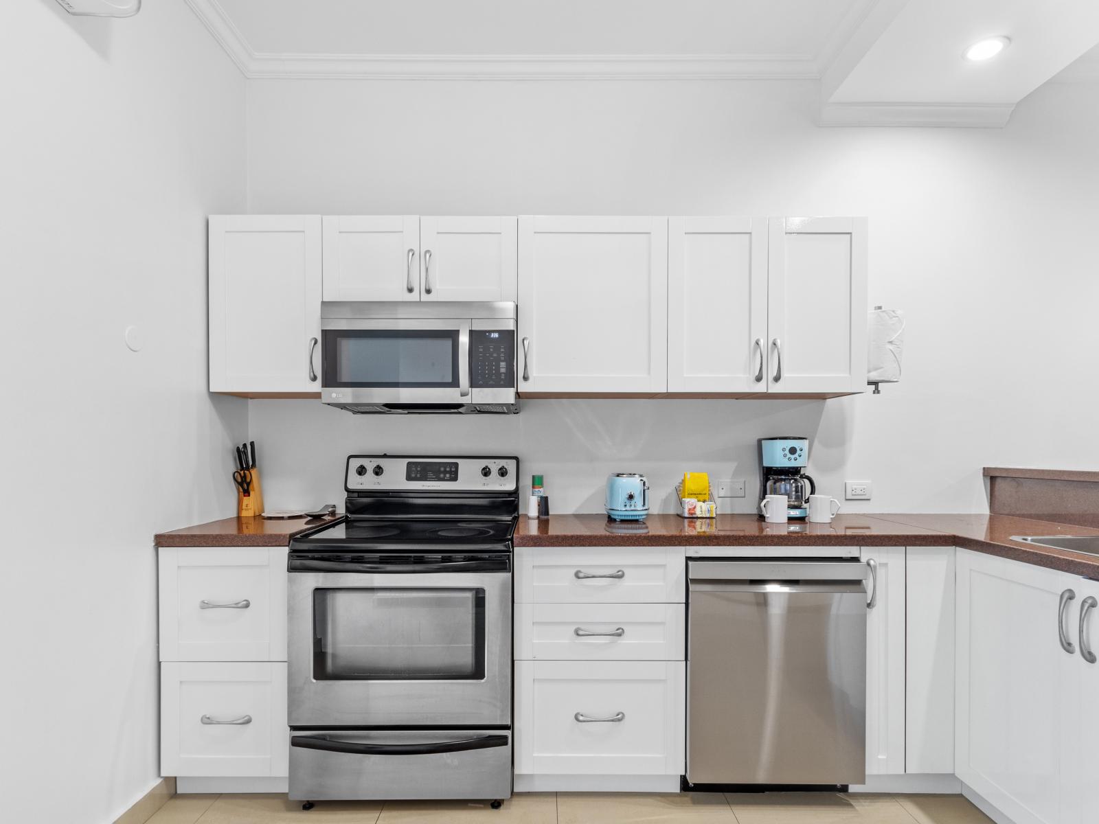 Imposing Kitchen of the 2BR Condo in Noord Aruba - Fully equipped kitchen - Plenty of storage space for organized and clutter-free counters