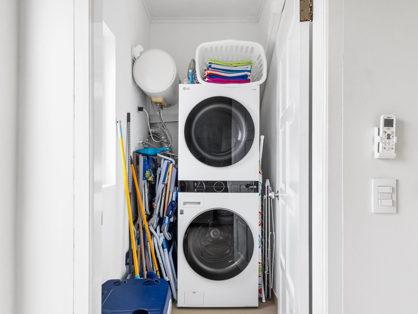 Laundry room with full size washer & dryer - We also provide beach chairs - A cooler and beach towels