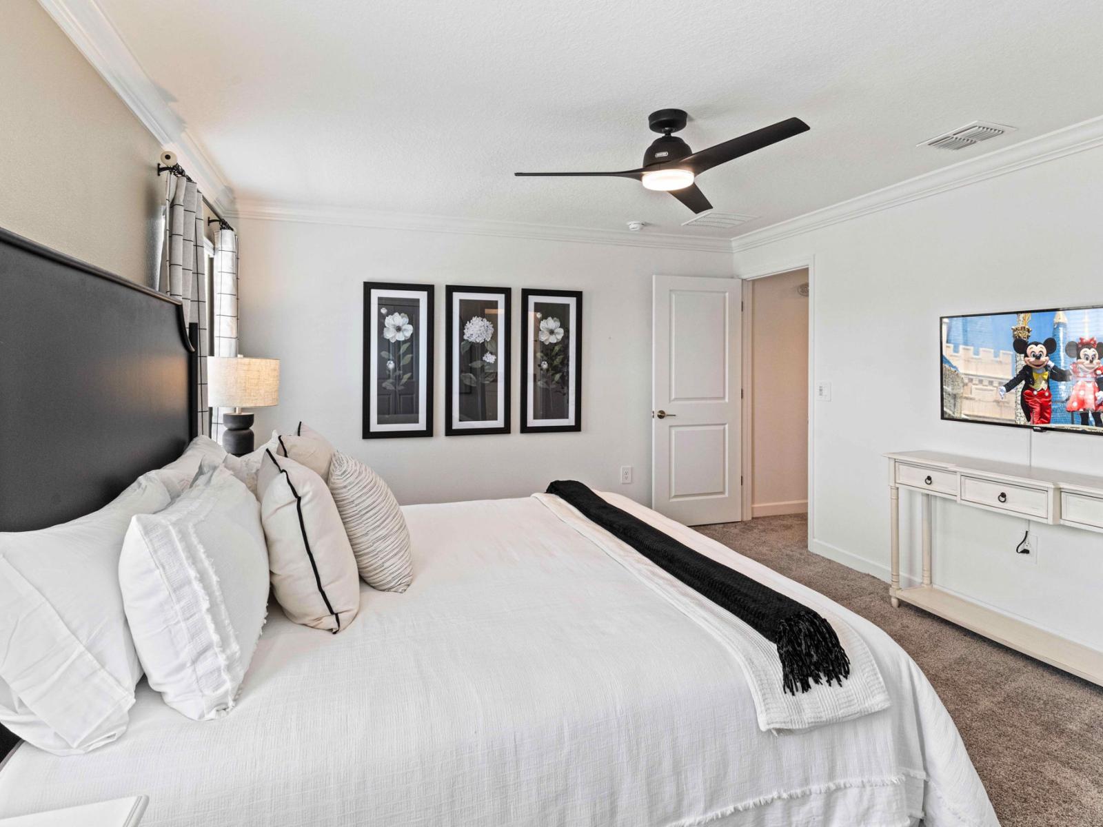 Experience regal rest in your private haven. Main bedroom with King size bed and Smart TV