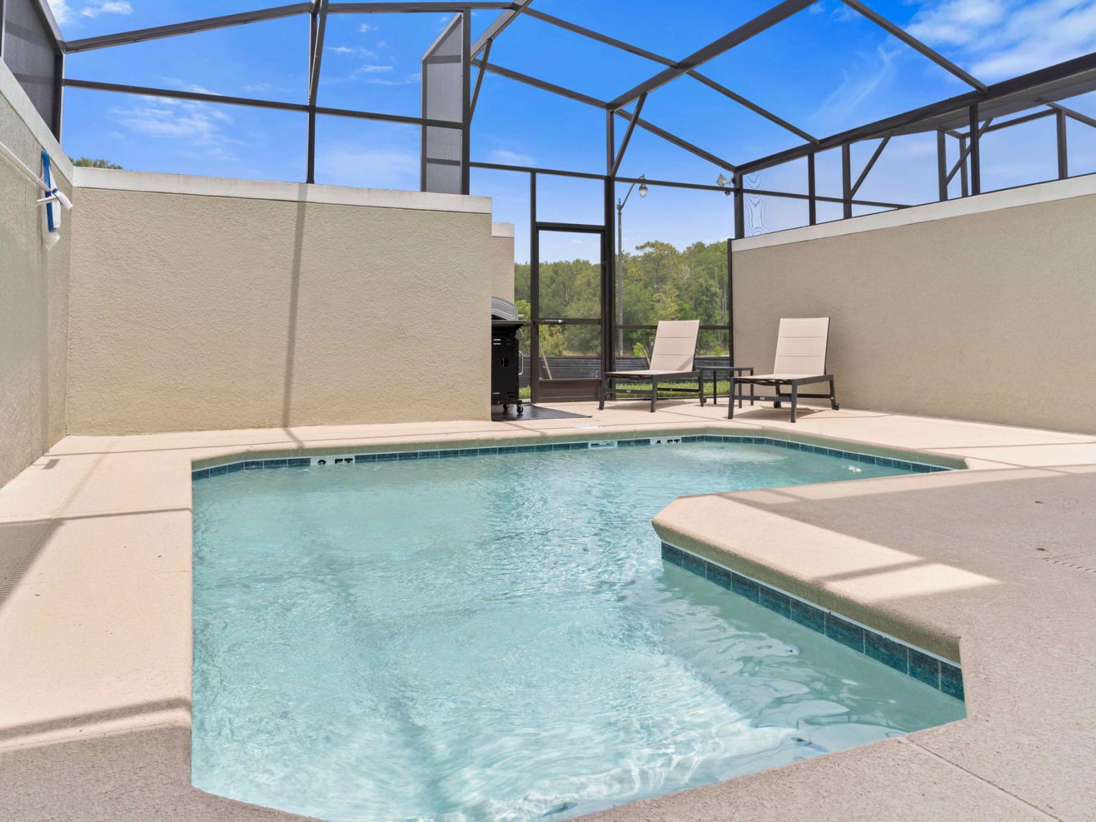 Stunning private pool of the townhouse in Kissimmee Florida - Relax by the shimmering poolside oasis - Bask in sun-kissed on comfy lounge chairsnear the water - Dive into a refreshing poolside escape