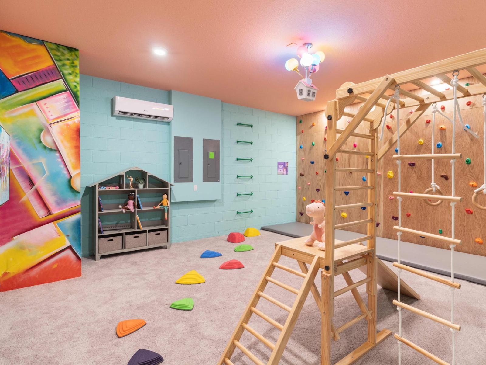 Indoor playroom with climbing wall