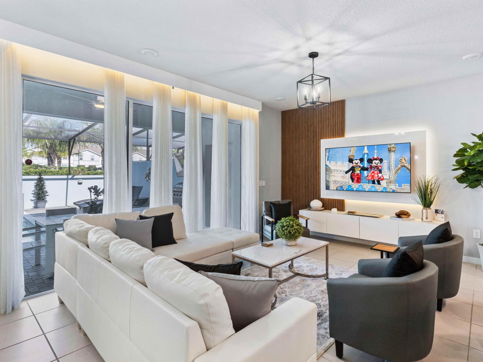 The living area, complete with a smart TV, offers a modern twist on relaxation and entertainment.