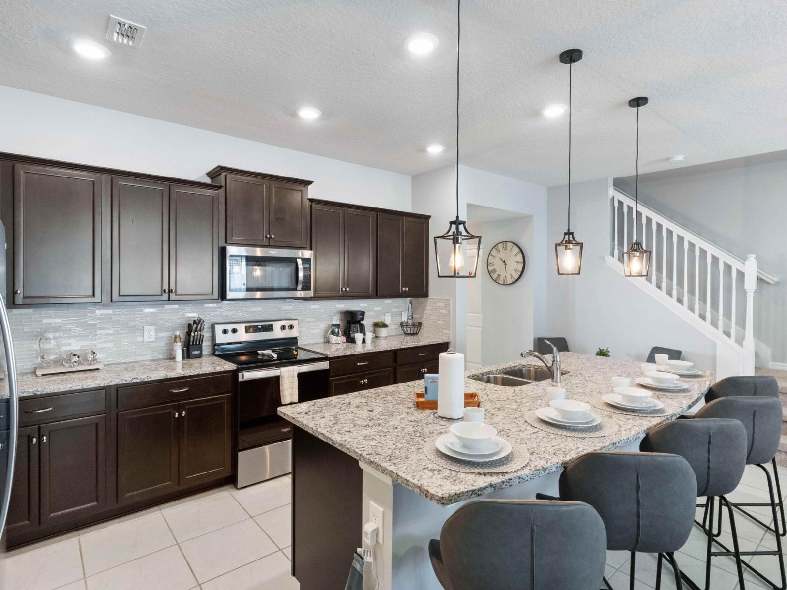 This fully equipped kitchen is a chef's dream, boasting modern appliances and ample space for culinary creations, where every meal becomes a masterpiece and every moment a delight.