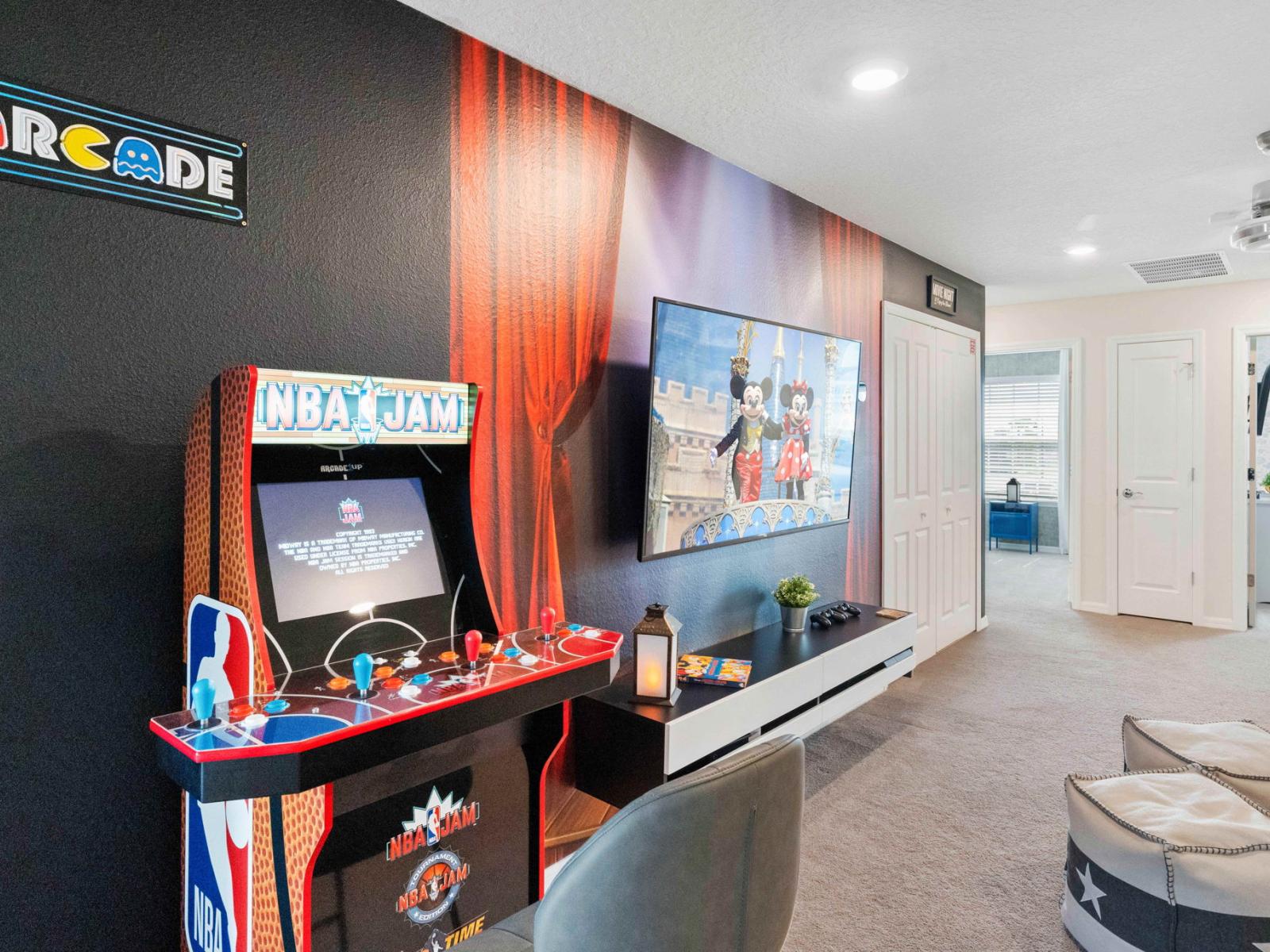 Welcome to the entertainment hub! This loft is equipped with a smart TV, arcade game, and console, promising endless hours of fun and excitement.