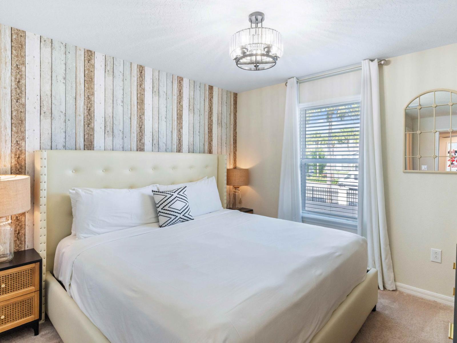 Bedroom 3 offers a regal escape with its king-size bed and smart TV, ensuring a luxurious and comfortable stay. With its ensuite bathroom, it's a sanctuary of relaxation and entertainment, promising indulgent moments and peaceful nights.