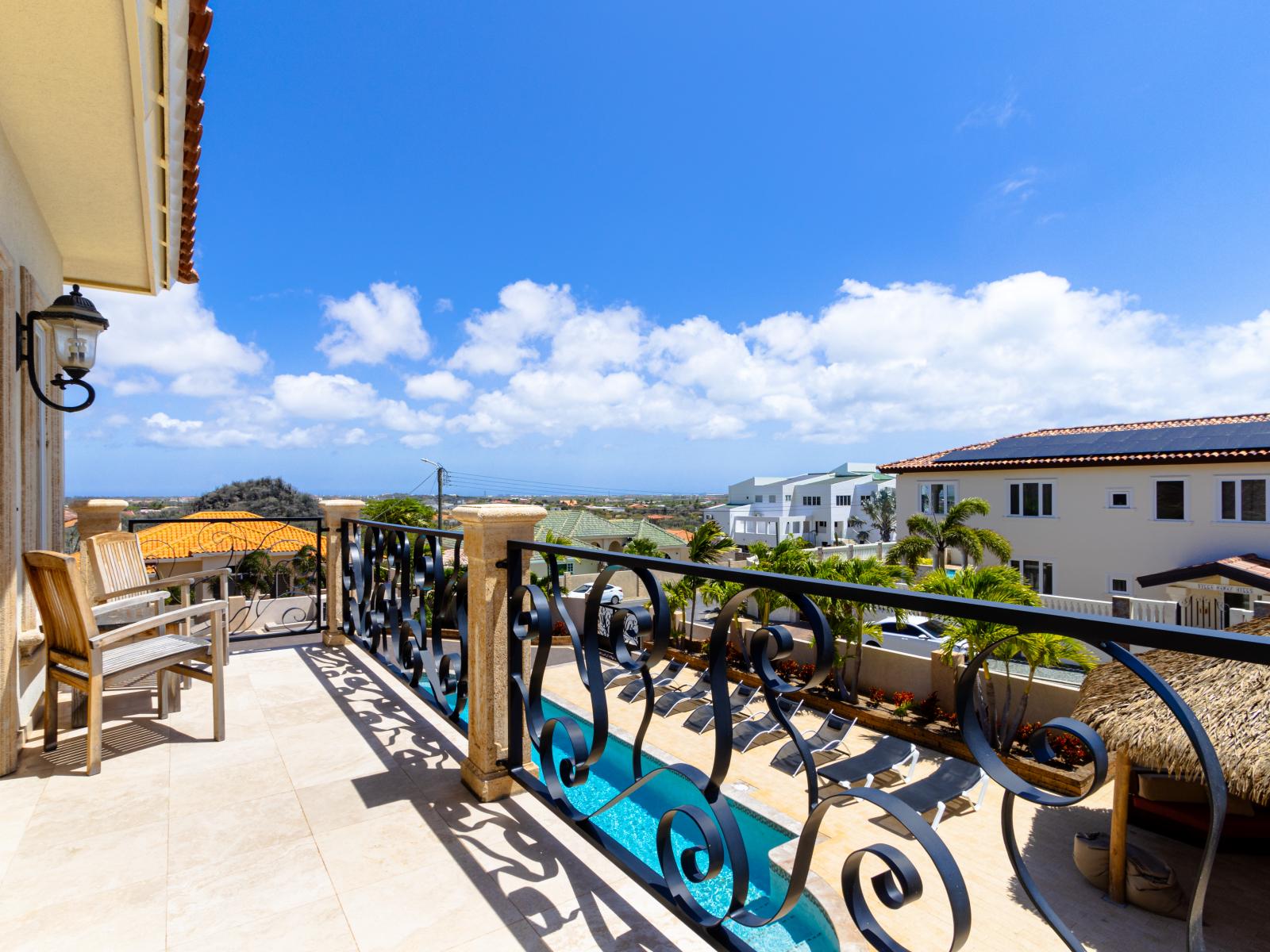 Looking in a different perspective, watch the horizon just above you and have a view of the pool from the balcony