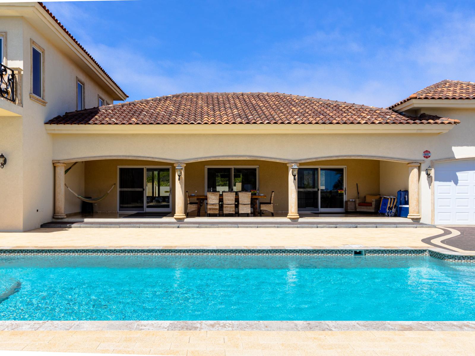 Your Private Paradise: Dive into Relaxation in Our Serene Backyard Oasis with Pool! 🏊🌴