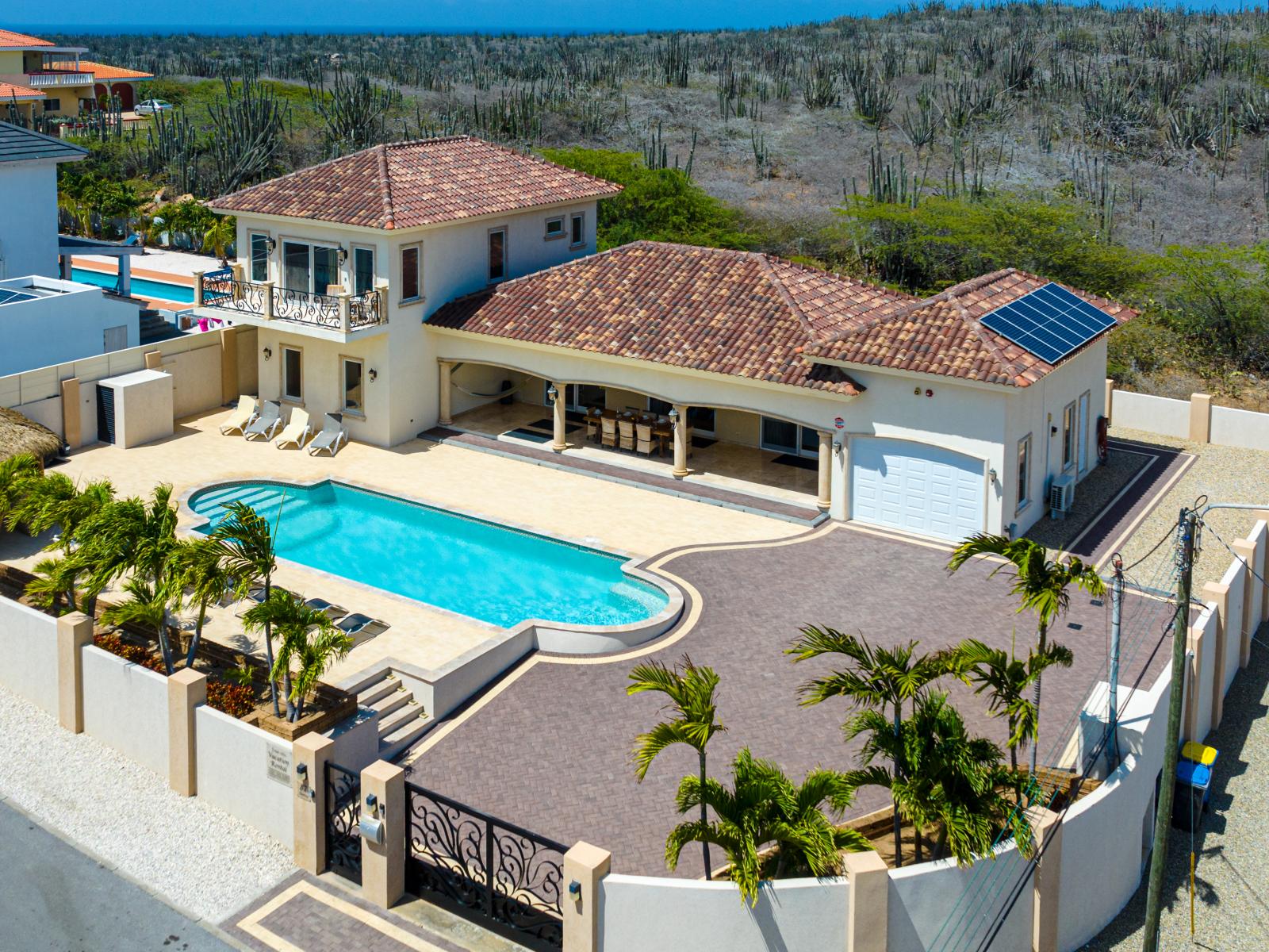 Unlock a panoramic perspective: behold the splendor of our property from above, where every detail harmonizes to create an unforgettable retreat.