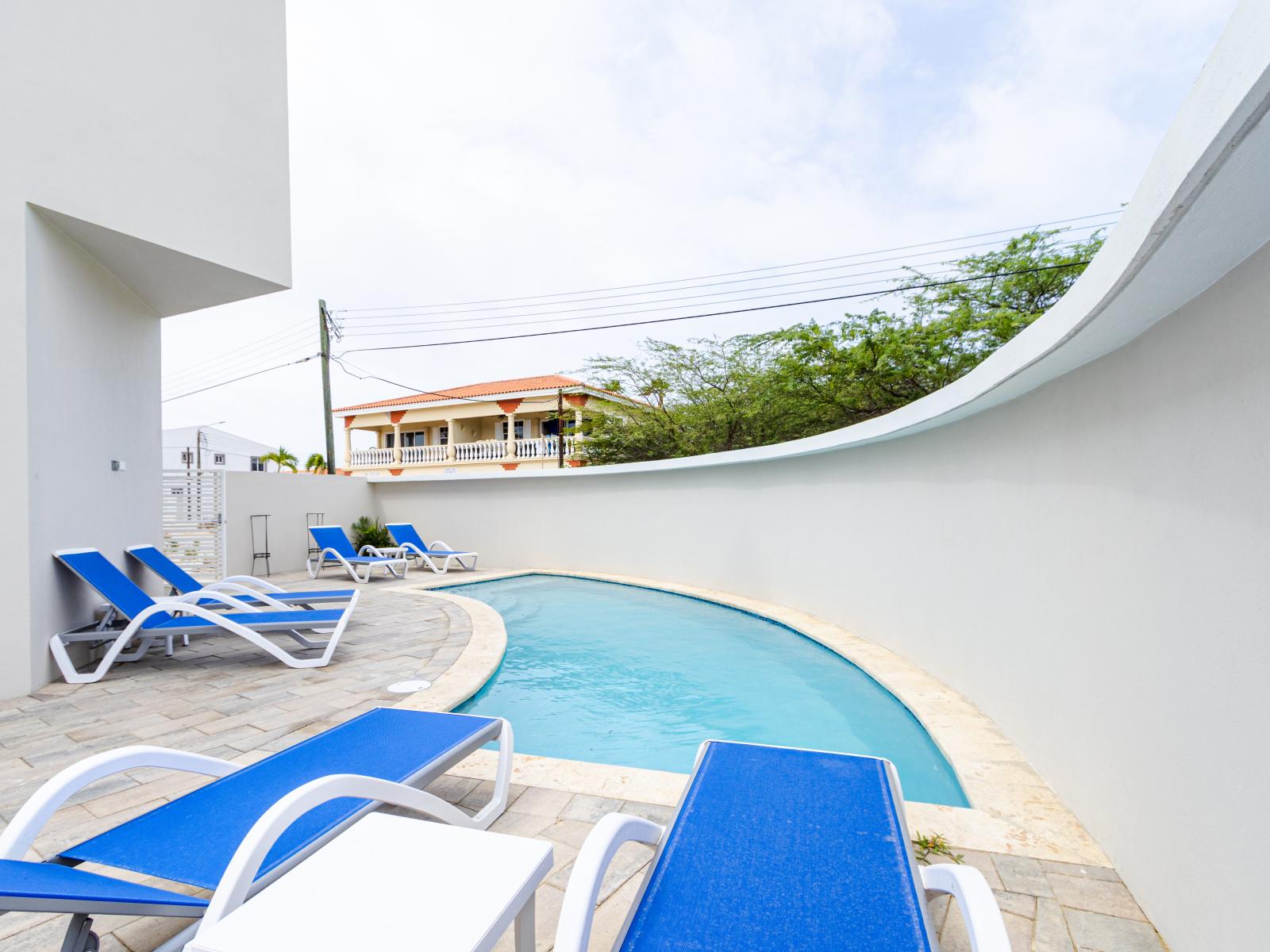 Join us for a refreshing dip in our inviting shared pool, a hub of relaxation and laughter.