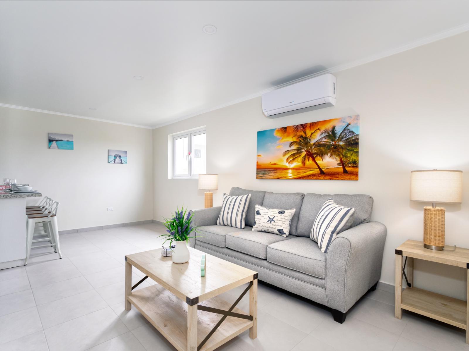 Alluring Living Area of the 2-BR Condo in Noord Aruba - Smart use of space with multifunctional furniture for a beautiful environment - Open-concept living area seamlessly connected to a stylish dining space - Smart TV and Netflix - Comfy Sofas