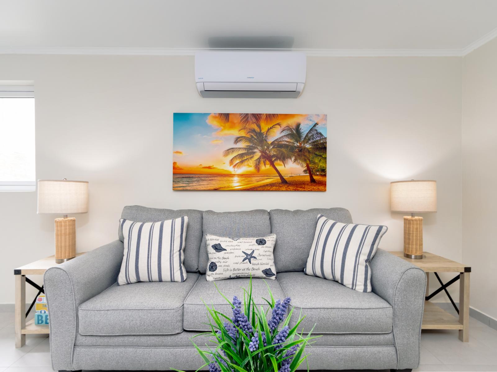 Radiant Living Room of the 2-BR Condo in Noord Aruba - Beautiful living room with an open layout - Stylish furniture arrangement providing comfort and a cohesive look - Thoughtful mix of textures and plush rugs - Smart TV and Netflix