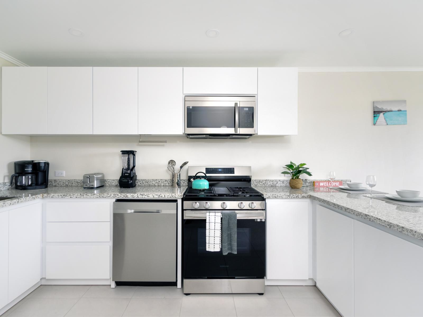 Enjoy the convenience and elegance of our fully furnished, modern kitchen.