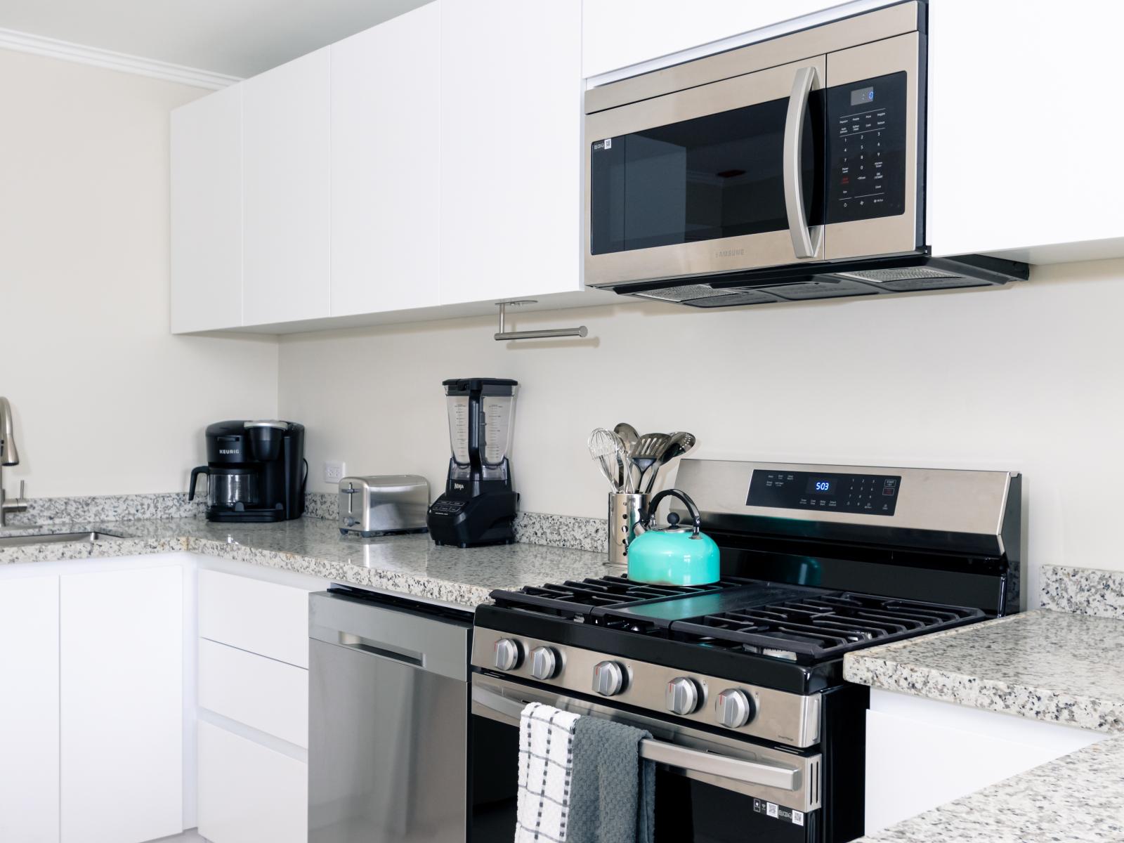 Our fully furnished kitchen offers modern design and functionality for a seamless cooking experience.