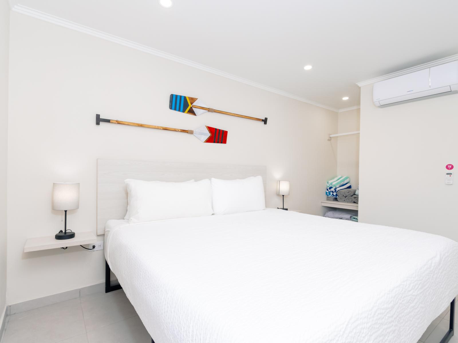 Find relaxation in our stylish second bedroom, designed around a luxurious king bed.