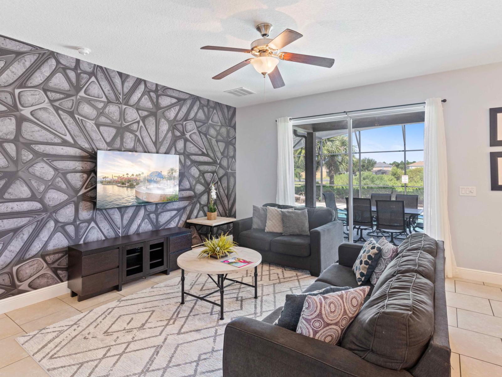 Stylish living area of the home in Davenport Florida - Unwind in the comfort, where modern aesthetics meet relaxation - Smart TV and Netflix - Relaxing seating with plush sofas