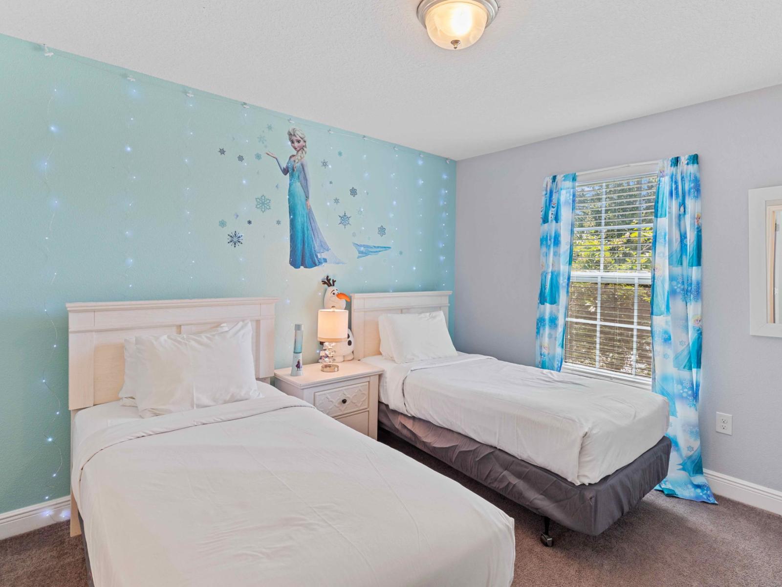 Frozen themed bedroom of the home in Davenport Florida - A haven for duos, offering twin beds and a cozy ambiance for a perfect night's rest - High-quality linens and fabrics for a sumptuous feel