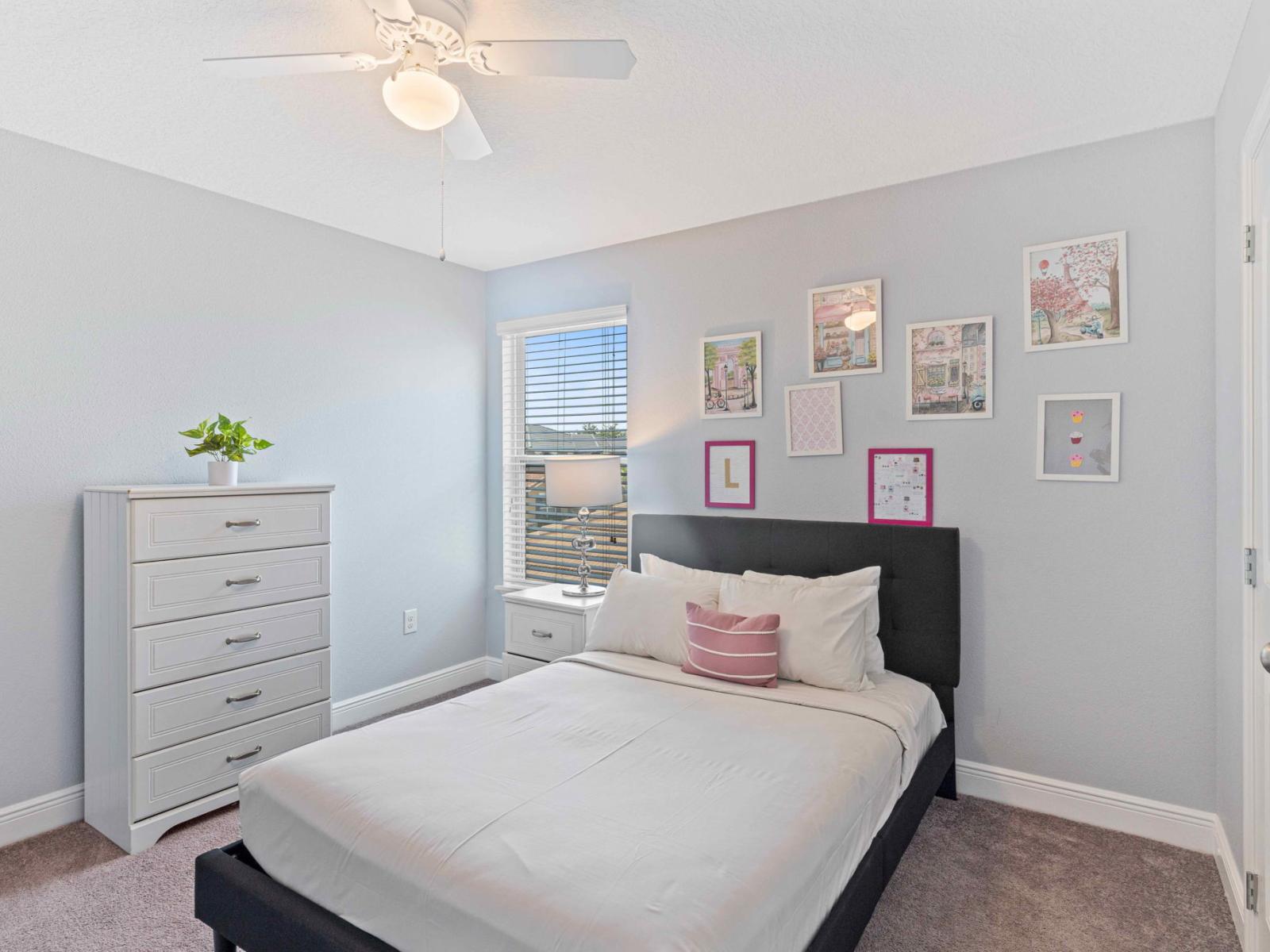 Sleek bedroom  of the home in Davenport Florida - A space designed for a restful and stylish stay - Cozy retreat with a plush bed, perfect for relaxation - Inviting atmosphere designed for a restorative sleep