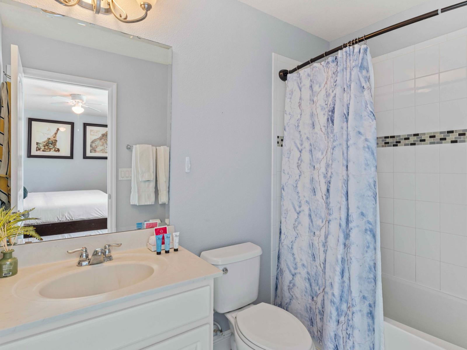 Bathroom 4 with a bathtub and a shower combo