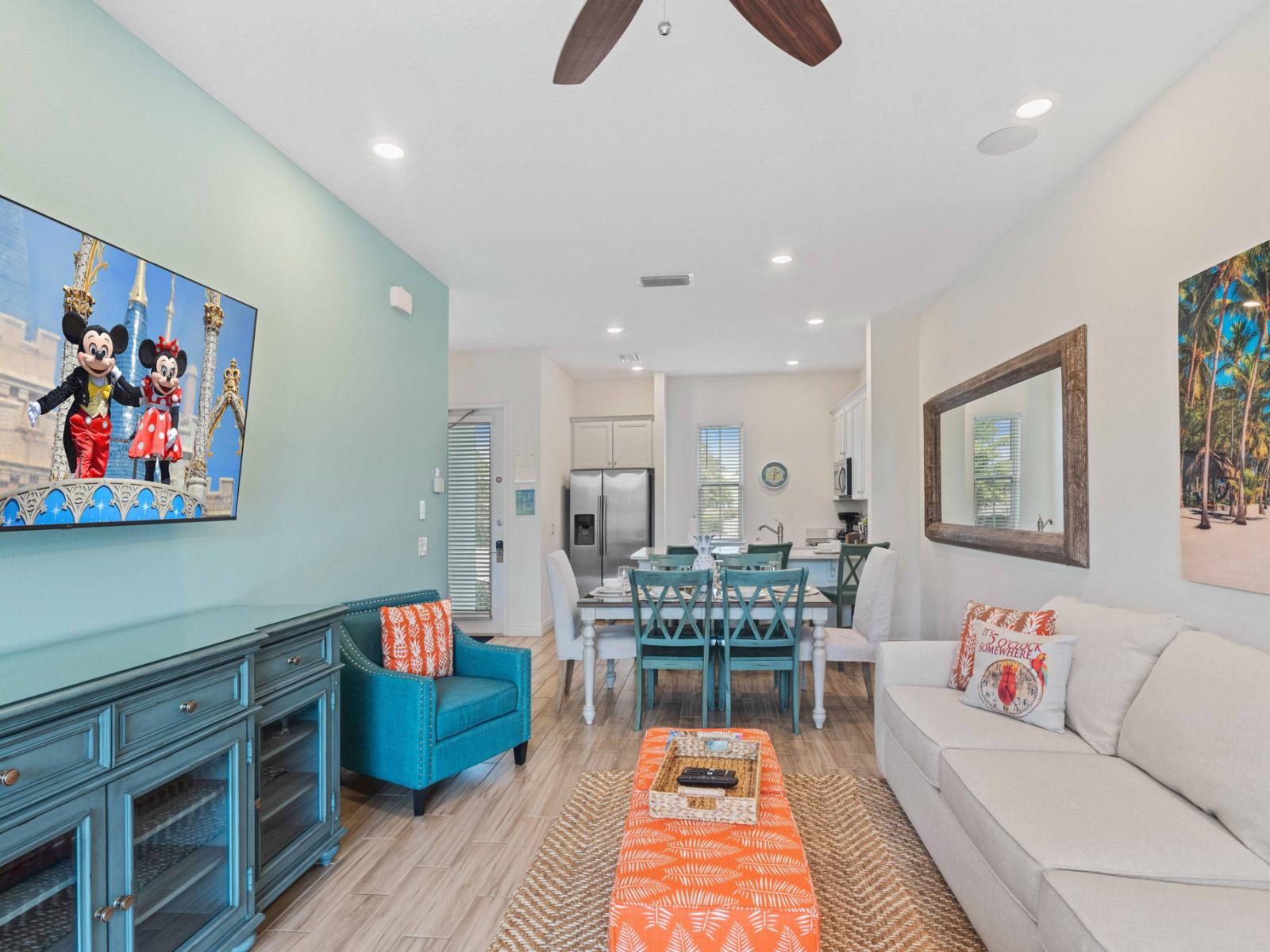 Beautiful townhouse in Reunion Florida - Open-concept design facilitates seamless flow between living, dining, and kitchen - Plush seating - Thoughtful lighting design creates a warm and inviting ambiance - Smart TV and Netflix