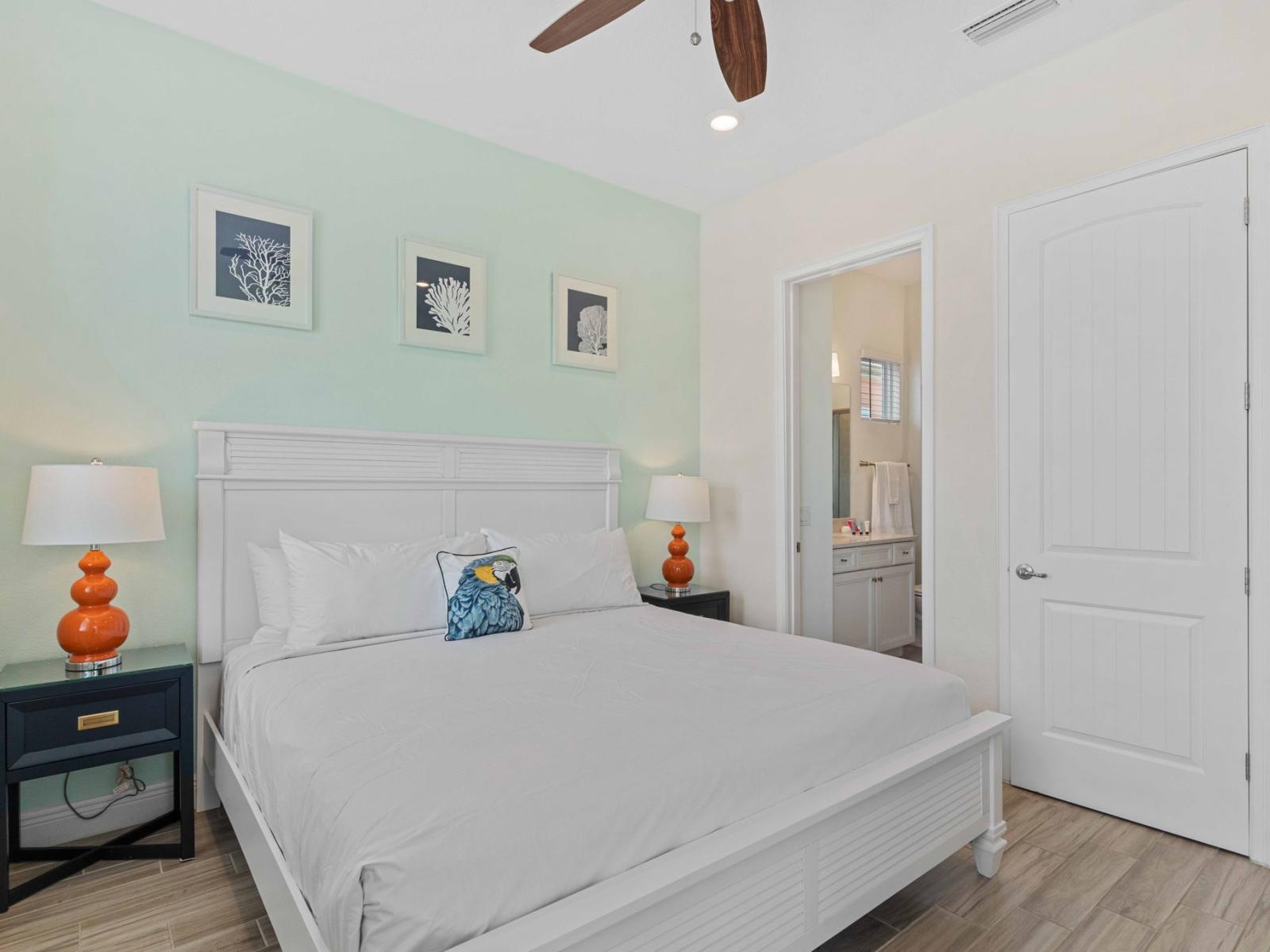 Swish bedroom of the townhouse in Reunion Florida - Minimalist decor, creating a clean and uncluttered sleeping space - Attached bathroom for privacy and convenience - Luxurious bedding for a restful night's sleep