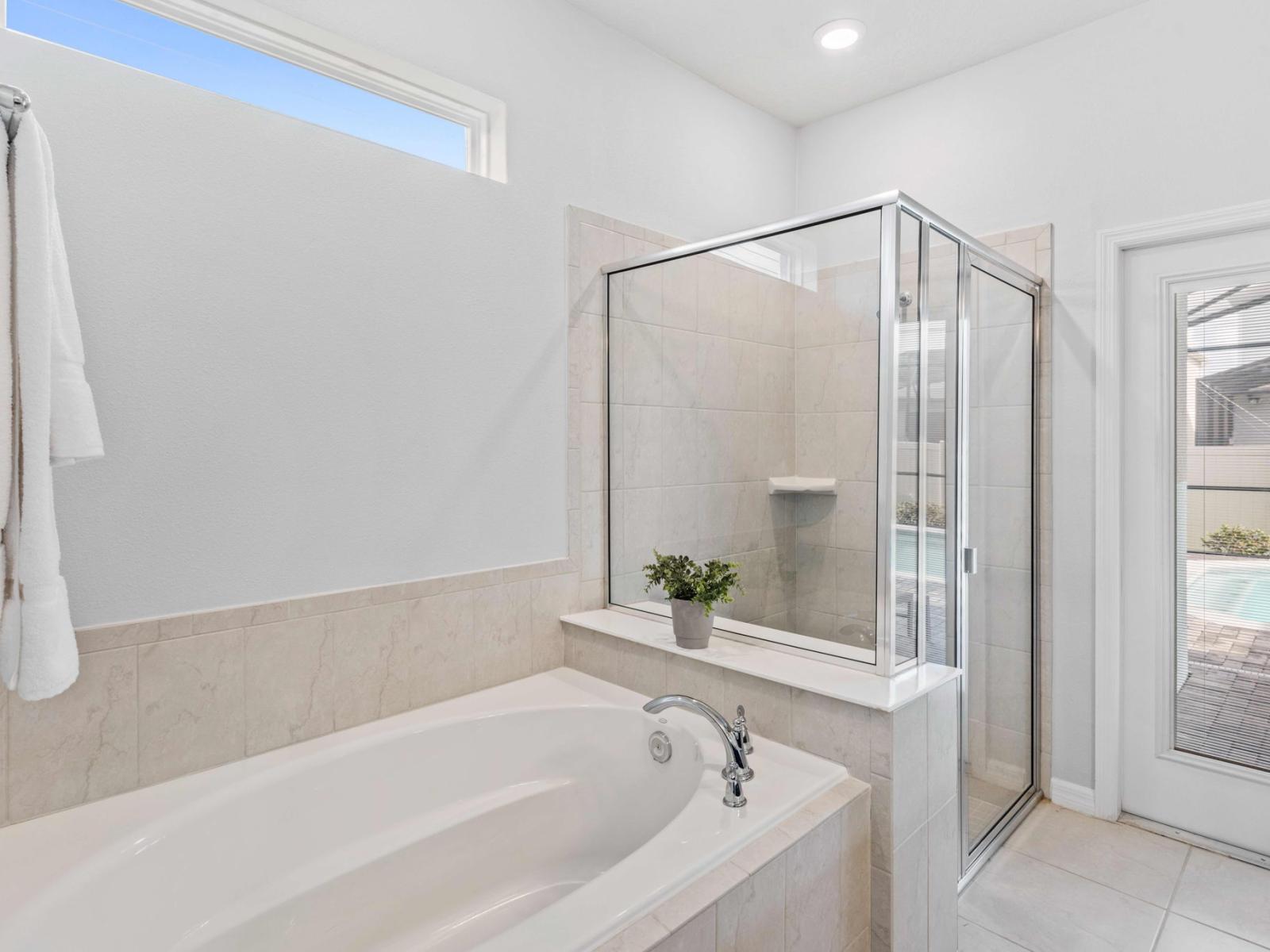 Bathroom 2 with bathtub and walk in shower