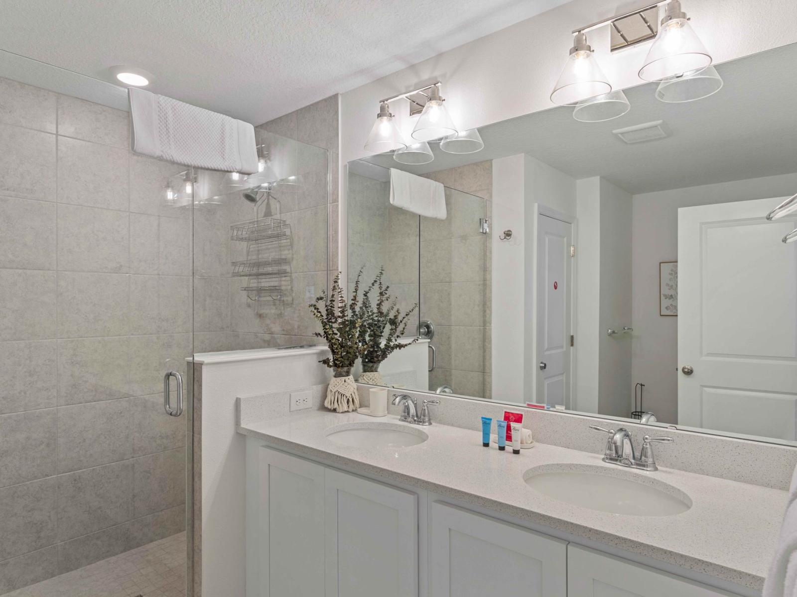 Bathroom Bliss: Refresh and Renew in Bathroom 1 with a Convenient Walk-In Shower for Your Refreshing Moments.