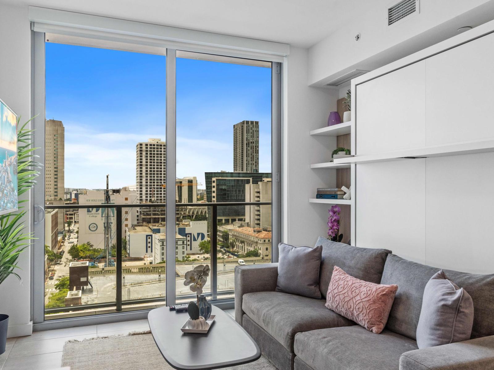 Unwind with a View: Bright Living Room with Panoramic Miami Skyline