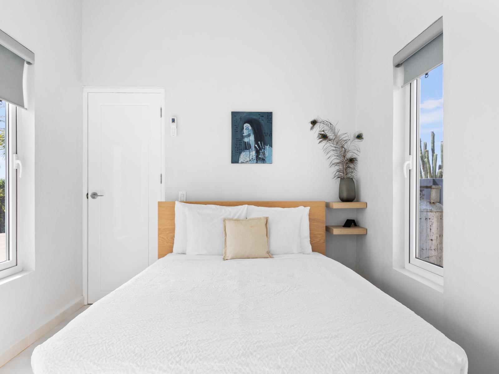 Bedroom 4 is filled with natural sunlight, enhancing its bright and inviting ambiance. For added convenience, blackout curtains are included, allowing you to create a dark, restful environment whenever desired. This makes Bedroom 4 ideal for relaxation.